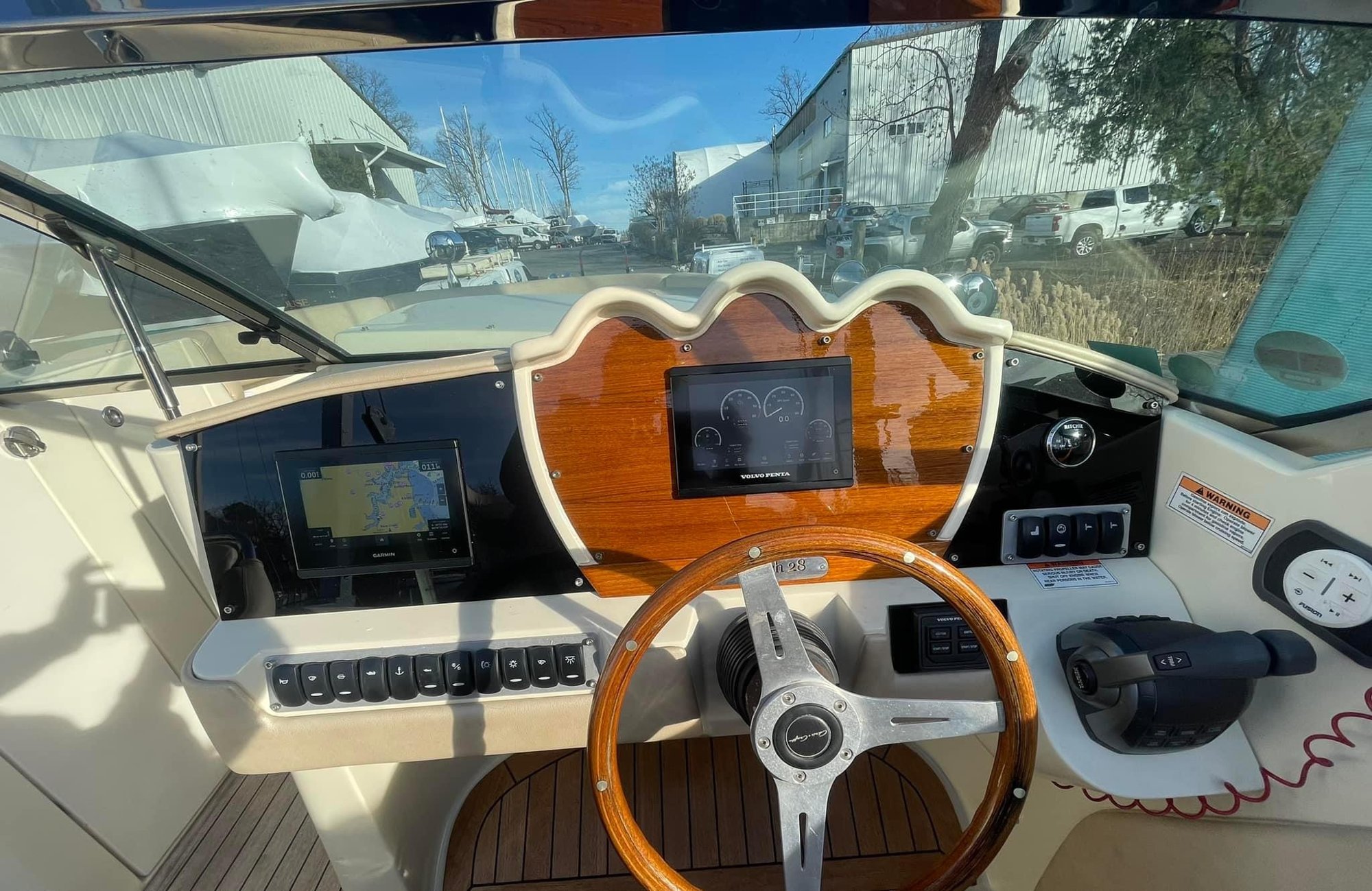 Classic runabout helm refit with a polished mahogany dash