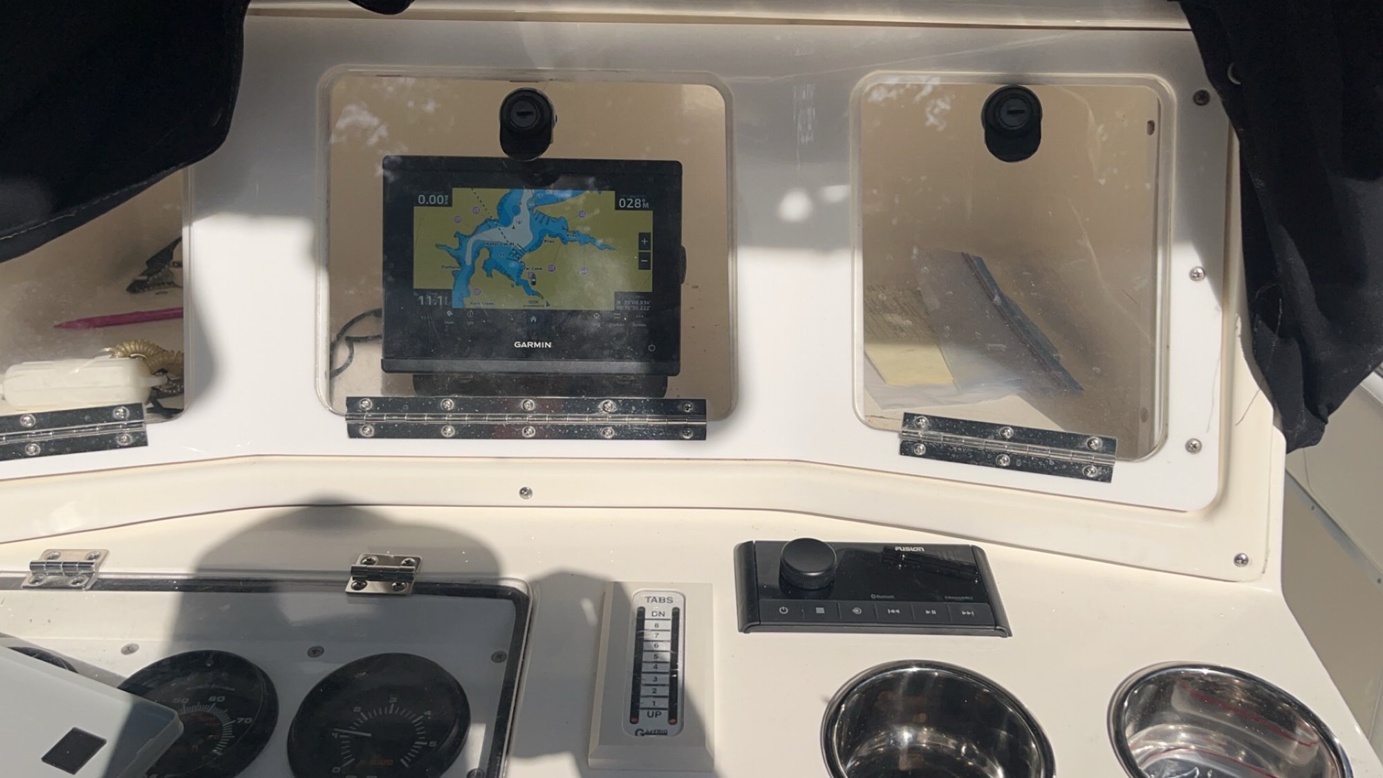 Helm electronics with Garmin chartplotter and Fusion stereo head unit