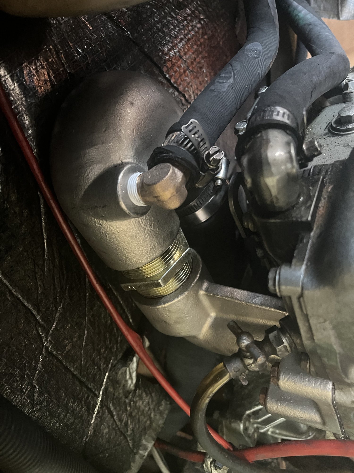 After: new bronze exhaust riser installed in place of the rusted one
