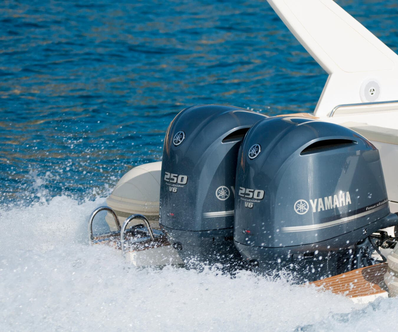 Twin Yamaha 250 V6 four-stroke outboard motors powering a boat through the water